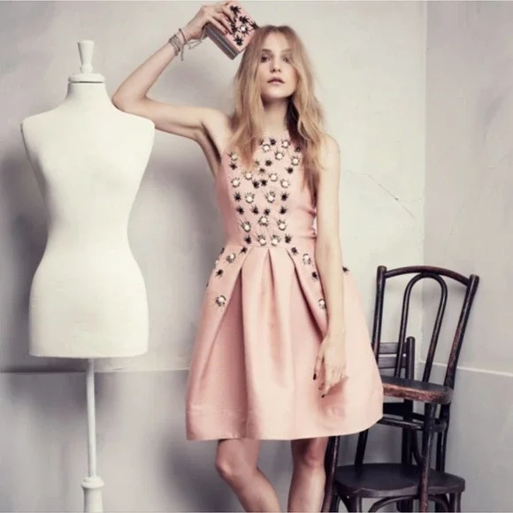 h&m beaded dress BALMAIN x H&M - Pre-owned viscose dress decorated with pearls (T34) main image 0